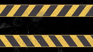 Yellow and black caution tape animation over dark background | Premium Stock Video Footage