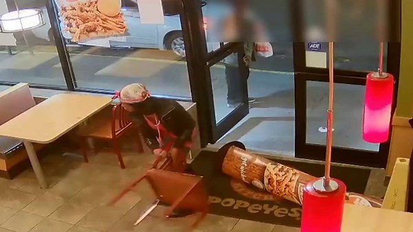 Woman Smashes Window In Fast Food Restaurant Popeyes