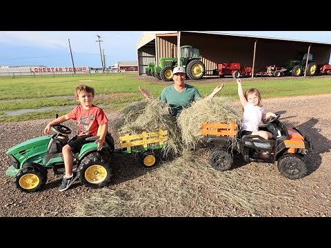Using tractors to move hay before big storm | Tractors for kids working on the farm