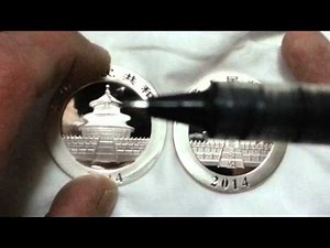 Counterfeit Chinese Panda compared to real coin. Part 1, inspecting the coin