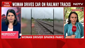 7.1K views · 44 reactions | Video: Woman Drives Car On Railway Tracks, Cops Struggle To Pull Her Out | NDTV | Facebook