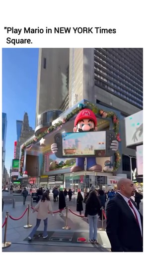 Trending | Viral | Clips | The video captures a massive, lifelike 3D Mario displayed on a towering billboard facade, seeming to step directly out of the screen and... | Instagram