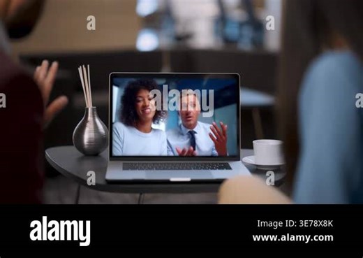 Business team talking at videocall using laptop webcam in modern cafe close up. Shoulder view couple remote managers video calling colleagues. Happy business people greeting at virtual conference Stock Video Footage - Alamy