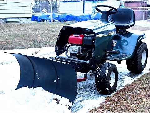 Homemade lawn tractor snow plow