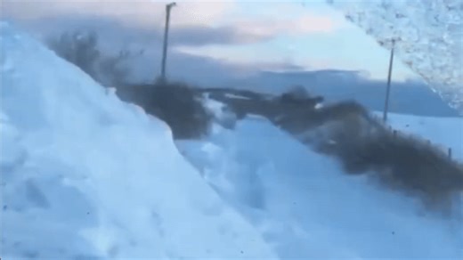 Train Plows Clear Heavy Snow on Scottish Railway Lines
