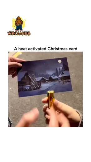 VIREXAHUB on Instagram: "The post features a 13-second video of a thermochromic Christmas card depicting a dark snowy village; applying heat from a butane lighter reveals hidden illuminated windows and tree lights, creating a "magical" glow effect that resets after cooling. Thermochromic inks in the card use leuco dyes that turn transparent at around 30°C, exposing underlying colorful prints; this reversible process, based on molecular structure changes, makes the card reusable and safe for brie