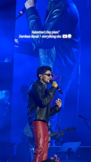 Parul University on Instagram: "Darshan Raval and Valentine’s Day was a match made in heaven. 🎶💙 With every song, every moment, the melodies felt softer, nostalgia hit harder and everything felt a little more special. Some nights don’t need candles and roses, just one soul-touching voice that makes a thousand hearts to feel the same emotions. ✨🫂 We’re awestruck, spellbound, and still in that love haze. Drop a 💙 if you felt the same. ❤️ [Darshan Raval, Live In Concert, Parul University, life 