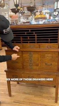 Oak tri-level file cabinet. Call 212-989-8814 to inquire!