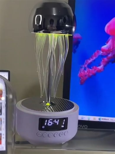 This isn’t just a lamp — it’s a vibe machine. 😍✨ Meet the 3-in-1 Jellyfish Ambient Speaker, combining a realistic jellyfish lamp, a breathing LED night light and a Bluetooth-compatible speaker all in one aesthetic design. Whether you're studying, relaxing, gaming, sleeping or setting the mood, the soft floating jellyfish effect and ambient light create the perfect cozy atmosphere. ✔️ Bluetooth music mode ✔️ Sleep-friendly breathing light ✔️ Built-in digital clock ✔️ Portable silent operation If