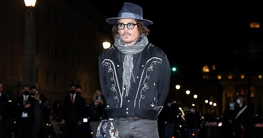 Johnny Depp Poses With Girlfriend Iuliia Vlasova in Rare New Photos