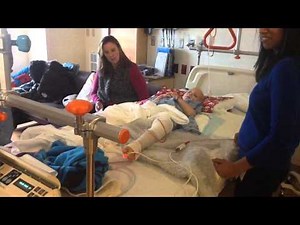 Zachary sitting up in bed for first time after his internal hemipelvectomy a week earlier.