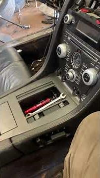 2011 Aston Martin db9 convertible center console removal