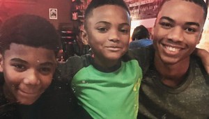 Lane Tech community lifts mother as cops examine mysterious death of her son