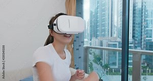 Woman wear VR device and play boxing at home Stock Video