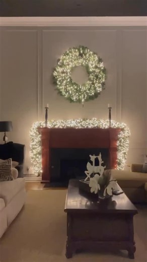Holiday Hangups | Christmas Decor on Instagram: "Comment “Cluster” for links and shake it to the max with cluster lights. Light up everything from giant wreaths to mantel garland with ease this Christmas Holiday. I used (1) 50’ Connectable Cluster light with 1500 lights on the giant 60” wreath and (2) 50’ Connectable Cluster lights with 3,000 lights on the mantel garland. That’s a total of 4,500 lights on this fireplace. Amazing! Follow here and stay tuned to see what I light up next! Comment, R