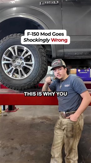 You've got a 12th Gen spacer on a 13th Gen, and the wheel's stuck tight on this Ford F-150. We're thinking of a solution, a bit of hammer time might do the trick. Guess what? The tire's still not budging. #automotiverepair #wheelreplacement #truckmaintenance