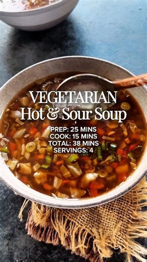This soup has a lot of vegetables and is lightly seasoned with soy sauce, vinegar, hot sauce and pepper. It is light and nourishing and also vegan. You can also make it gluten free by using a gluten free soy sauce. | Cook with Manali