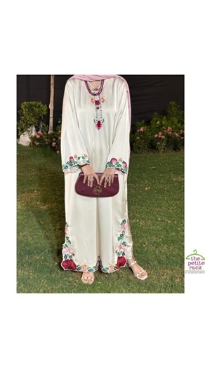 The Petite Rack by Aalisha on Instagram: "Designed by me, for me 💖 A pearl off-white ensemble where comfort meets quiet luxury. From fabric selection to embroidery colours, floral forms, and stitching — every step involved patience, precision, and passion. Finished with hanging buttons and paired with a maroon–pink shaded dupatta for a graceful contrast."