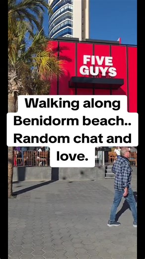 Walking Along Benidorm Beach: Random Chat and Love