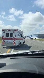 Plane Clips Ambulance in Emergency Landing Galveston, Texas — November 12, 2025 A routine day at a regional airfield took a harrowing turn Sunday afternoon when a small twin-engine aircraft attempted a desperate emergency landing on a perimeter road. The pilot reportedly declared a "Mayday" shortly before losing altitude and making contact with a moving emergency vehicle that was already on the scene. Video footage captured by a motorist shows the aircraft descending rapidly over the roadway. As