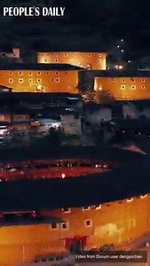 Dwellers enjoy warm family time amidst bright light at Tulou, a type of ancient buildings of Hakka people in East #China’s #Fujian. In 2008, Tulou was added to the #WorldHeritage List as a cultural site. | Xi's Moments