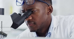Science, research and black man with microscope, study and medical engineering in laboratory. Biotechnology, investigation and pharmaceutical test, scientist or technician with glasses for analysis.