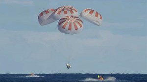 Watch SpaceX capsule splash down in return to Earth