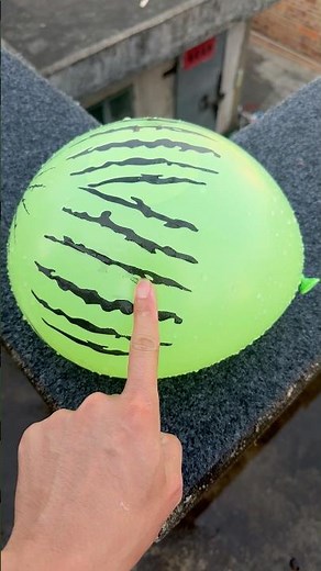 Experiment: Will a water balloon explode if it rolls down a tall building? 💥🎈 #balloon