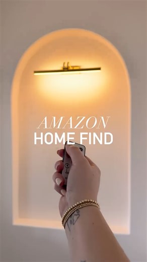 Carissa Nunez on Instagram: "favorite amazon home find of the week ✨add a touch of fancy to any space with this remote control, cordless and rechargeable picture light. comment LIGHT and I’ll send you the link #amazonfind #amazon #amazongadgets"