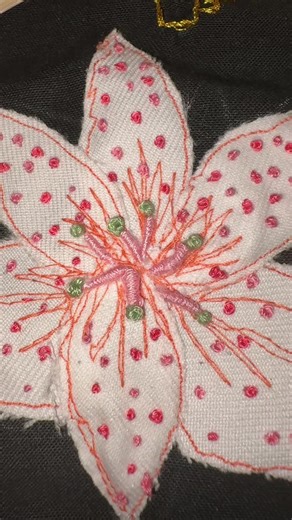 Embroidered lily flower using appliqué and free motion embroidery on a sewing machine, bullion stitches and French knots 🌸 #embroidery #freemotion #applique #textiles #textileart