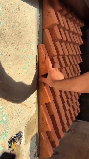 Transforming a Plain Wall with a Unique Diagonal Brick Pattern Design