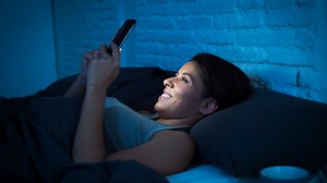 Using your phone before bed is unlikely to ruin sleep, expert claims