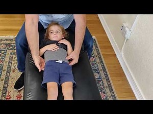 Adjusting a child's sacrum.mp4