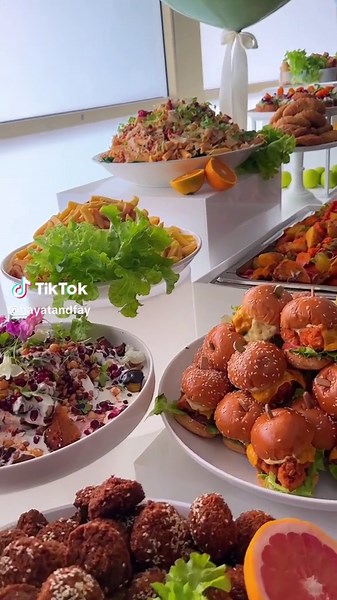 Vibrant Food Display: Salads, Sandwiches, and More