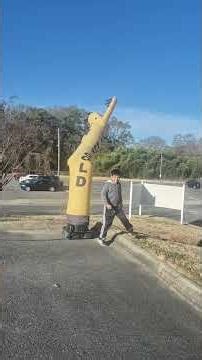 yellow air dancer dancing on the Wind