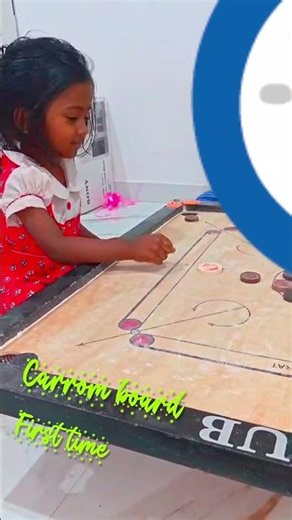 Reya playing carrom board first time..at her 2.5 years.. memories bring back..2026 #playcarrom