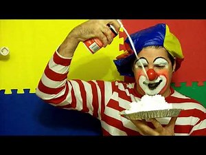 A clown experiencing some pies in the face