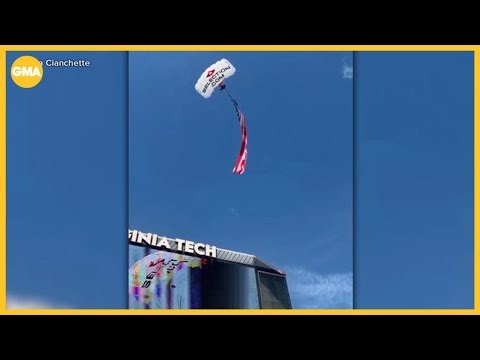 Skydiver speaks out after crashing into scoreboard at college football game