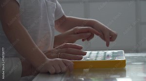 mother and child learning alphabet on smarty alphabet tablet to learn letters, ABC, numbers, shapes, colors, music and words. Interactive toddler learning and education toys for kids boys and girls