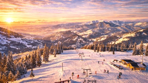 A winter town in the Bucegi Mountains covered in snow