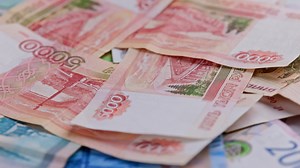 Looped rotation of Russian rubles paper banknotes of different dignity.