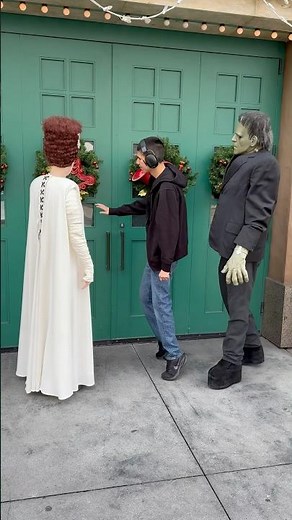 Thomas checking out the wreaths with the Bride and Frankenstein #shorts #universalstudios #autism