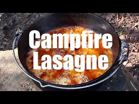 Dutch Oven Lasagne Cooked Over an Open Fire. Cast Iron Cooking. Baker Tent.