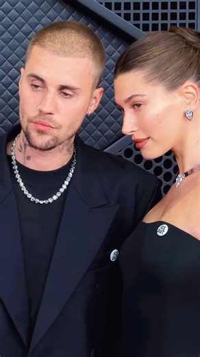 TLM™ on Instagram: "Hailey is a literal work of art in custom Alaïa by Pieter Mulier. That sheer jersey bustier? The train? Absolute perfection. And don’t even get me started on the 50+ carats of Lorraine Schwartz diamonds. That 30-carat pear-shaped pendant is basically its own zip code. ​Justin stayed iconic in his signature oversized Balenciaga silhouette. The blonde buzz cut is back, the silver is hitting, and the "Dad Era" glow is very, very real. ​From the fashion to the "ICE Out" statement