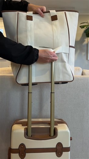 1.7M views · 5.9K reactions | This Rolling Tote does it all!  Removable wheels for easy travel, plenty of storage for everything you need, and it slides over your suitcase making it the PERFECT personal item! Get it on SALE today! | Marleylilly - Monogrammed Gifts | Facebook