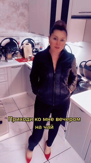 Stylish Kitchen Fashion: Black Leather Jacket and High Heels