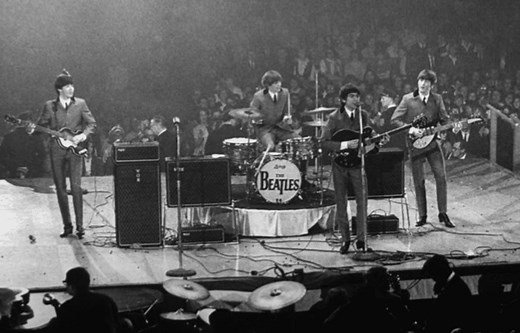 On This Day in 1964, The Beatles Arrive in the U.S. for Their First Iconic Concert