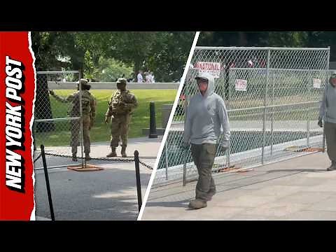Fencing Going Up Around Reflecting Pool In Washington DC