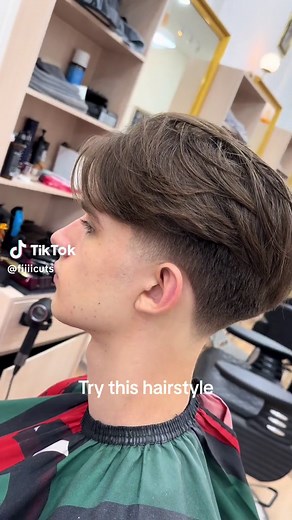 Try this hairstyle in 2023 middle part taper fade #fyp #barberbangkok #fijiicuts #bangkokbarber #fadesbangkok #bangkokfades #fadesbangkok #bangkokfades #taperfadehaircut #taperfadesbangkok #texturedhair #menshaircut #middlepart #thailand🇹🇭