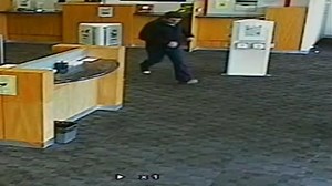 Brazen bank robbery CCTV released